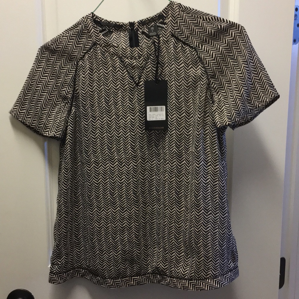Size small new with tags scotch and soda blouse.